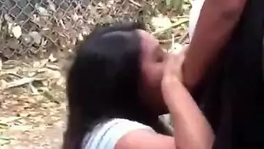 Hot college girl caught sucking cock in park