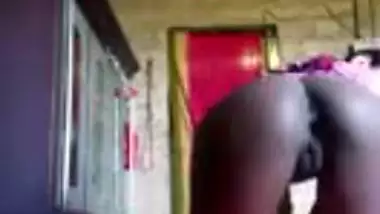 Village chick hikes up dress to reveal her XXX ass and pussy online