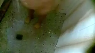 Desi love likes showering and doesn't pay attention to XXX camera