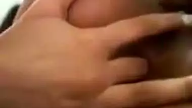 An Indian nude girl fingers her shaved pussy and ass
