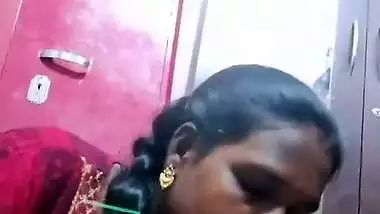 Mature tattooed Tamil wife giving handjob to husband