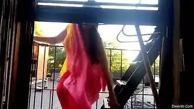 crawling out window on a windy day