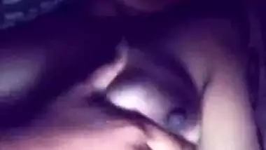 Indian aunty squeezes her own boobs like crazy in close-up video