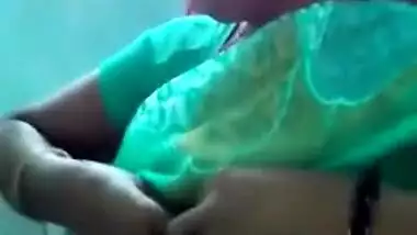 Horny Indian female un green helps man relax touching her XXX boobs